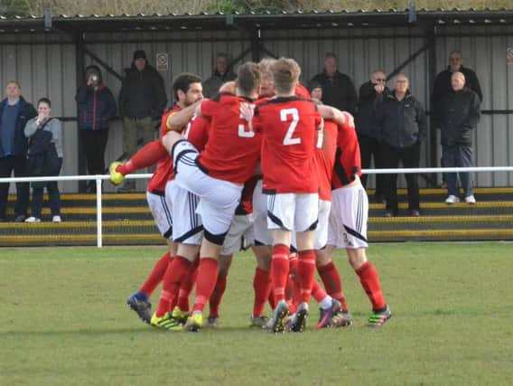 Heath celebrate McCreadie's goal. Picture by Grahame Lehkyj