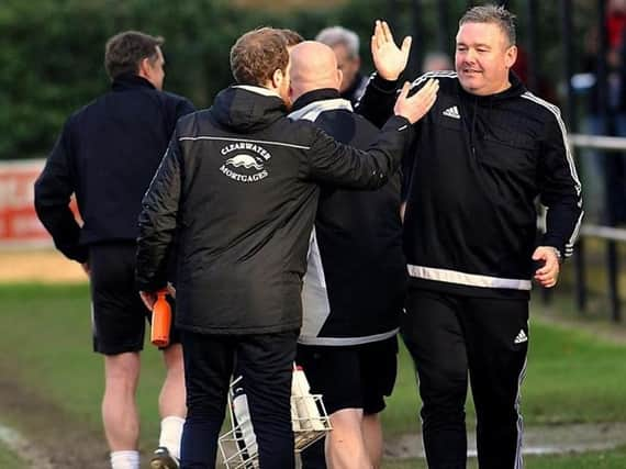 Golds boss Ady Baker celebrates Saturday's win over rivals Arundel. Picture by Stephen Goodger