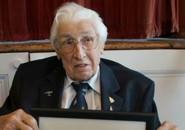 Bill Lucas with his Certificate of Achievement. Picture: West Sussex County Council