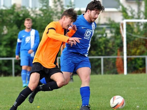 Joseph Benn's free-kick fired Mile Oak in front last night. Picture by Stephen Goodger