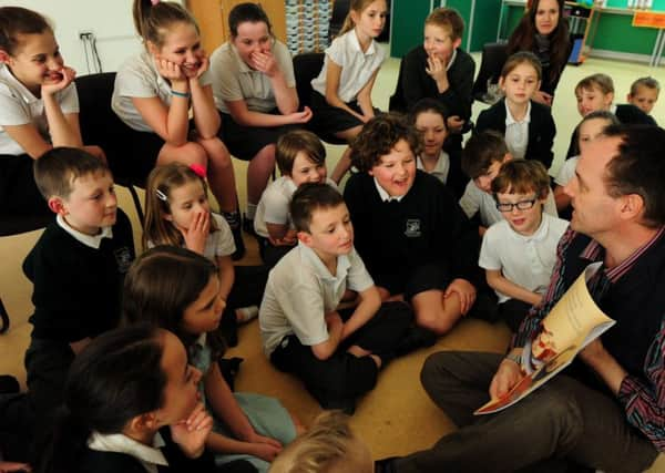 Author Billy Bob Buttons, Edward Hugh Trayer, who gave a workshop to pupils at Bury Primary School. Picture: Kate Shemilt ks170131-2