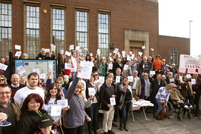 The mass protest outside Chichester Crown Court almost exactly a year ago. Photo by Derek Martin. SUS-161203-205445008