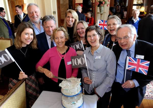 Virginia Lewis-Jones, Dame Vera Lynns daughter (centre in pink) with charity members at the tea party in Danny House last Friday (March 24). Picture: Steve Robards