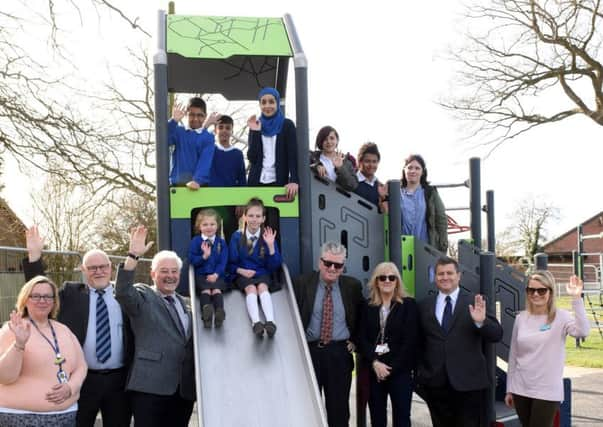 Children enjoying the new Langley Green play area. Picture: Jon Rigby