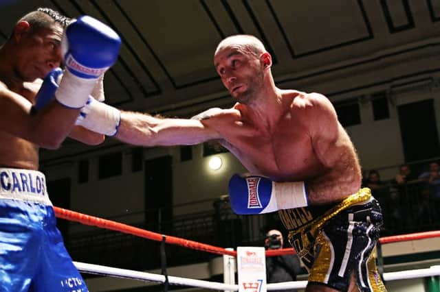 Ben Jones in action against Carlos Osorio (Nicaragua) at York Hall. Picture by Natalie Mayhew, Butterfly Boxing SUS-160811-120248002