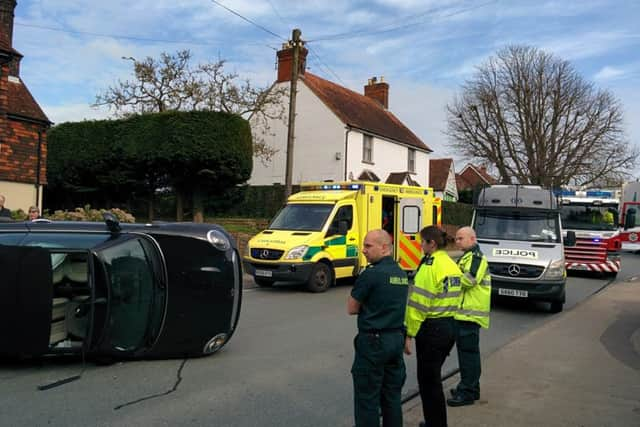 Car on its side in Storrington crash