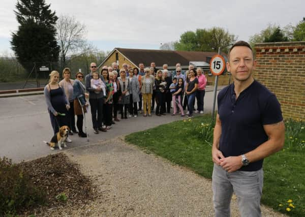 Richard Fisher (foreground) with concerned residents.  Picture: Grant Melton