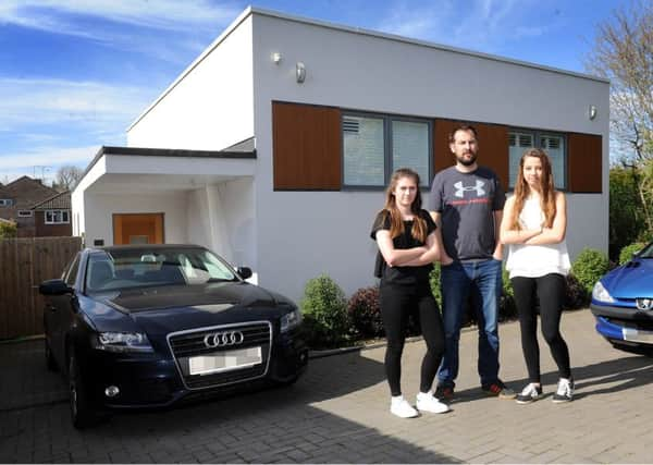 Ashley Mills with his daughter Lydia and her friend Millie. Picture: Steve Robards