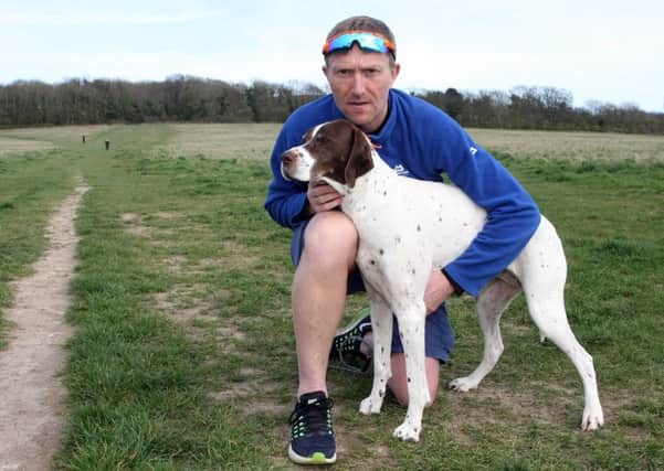 Mark Friend-James with his dog Elsi. Photo by Derek Martin SUS-170330-191236008