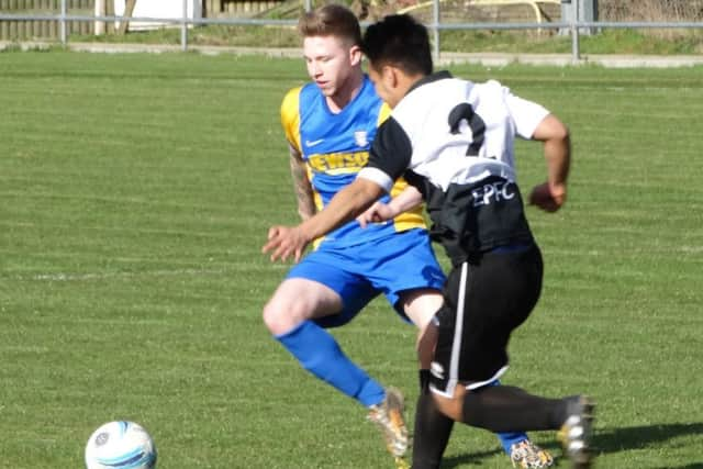 Corey Wheeler tussles for possession against East Preston. Picture courtesy Mark Killy