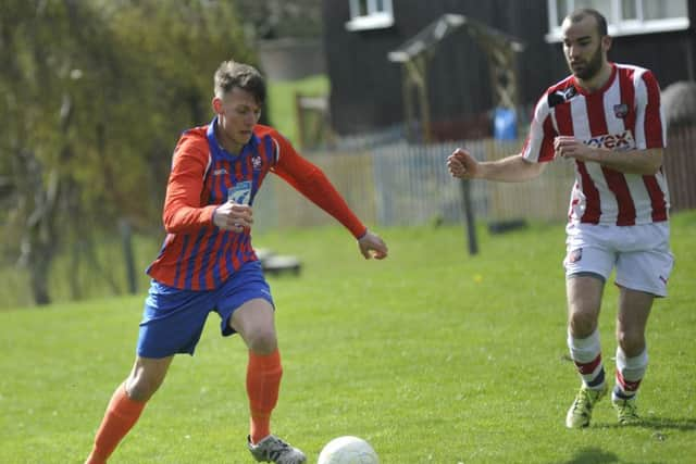 Two-goal substitute Finlay Garlick on the ball.