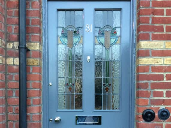 A coloured glass door by Ace Joinery Solutions