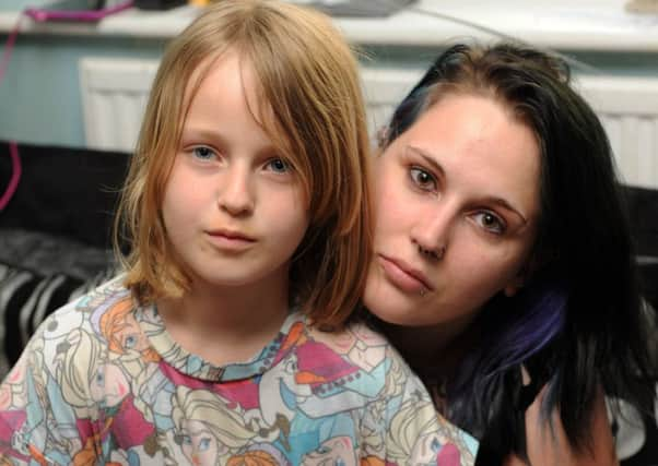 Vikki Packham and her daughter Ruby (7) at their home in Eastbourne (Photo by Jon Rigby) SUS-171004-085055008