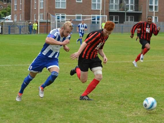 Tadley Bromage was forced off through injury for Worthing United on Saturday. Picture by Grahame Lehkyj