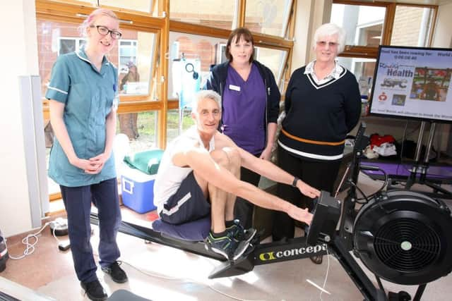 Neal with staff Caitlin Sutterby and Hayley Edwards and his mother Janet. Picture: Derek Martin