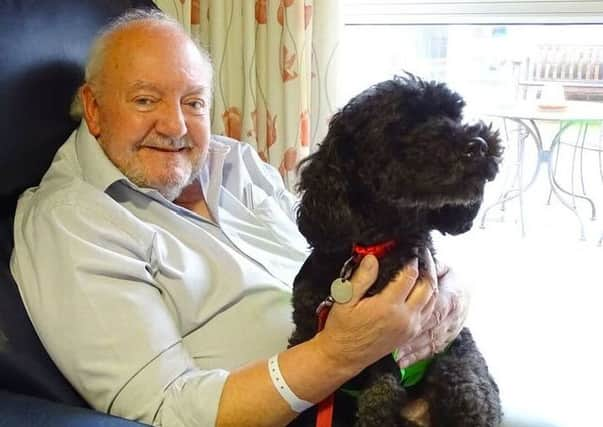 Buzz with patient Graham at St Wilfrid's Hospice, Chichester