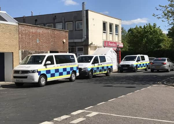 Immigration vans in Crawley town centre