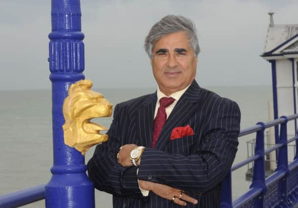 Mr Gulzar on Eastbourne Pier (Photo by Jon Rigby) SUS-160408-083055008