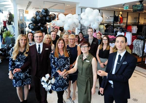 The manager of the new Next in Rustington, Julie Davis, with staff on opening day. Picture: Kate Shemilt