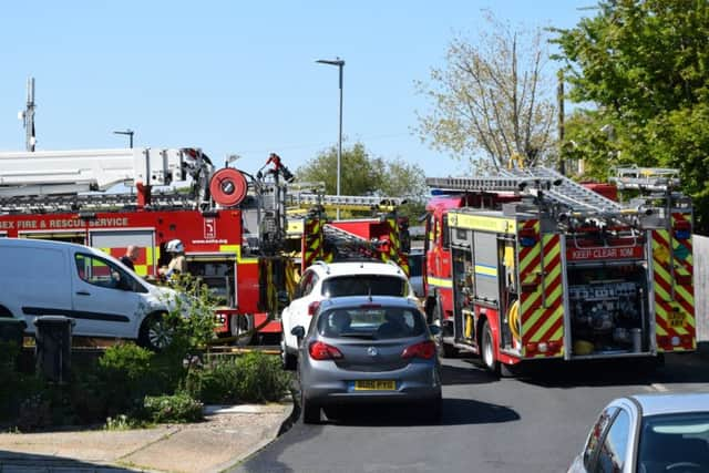 Firefighters tackling a blaze at a derelict house in Swanley Close in Eastbourne, by Langney Shopping Centre. Picture: Dan Jessup