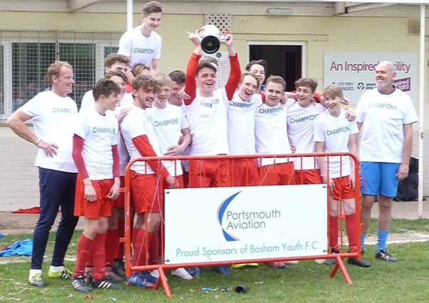 Bosham under-16s celebrate their league triumph / Picture by Nicki Webb