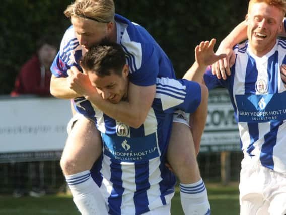 Heath celebrate a goal on Saturday. Picture by Derek Martin