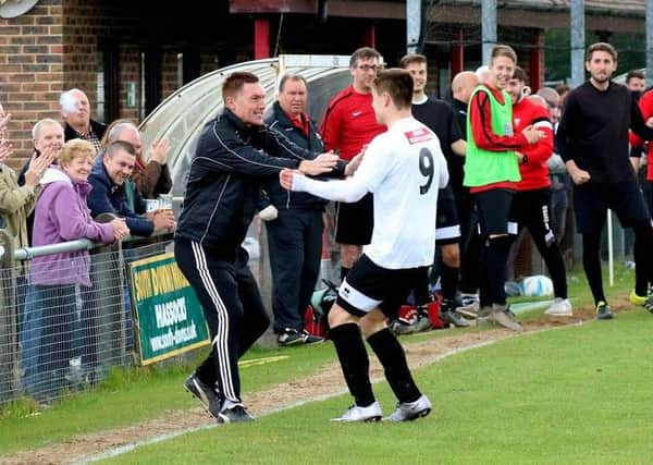 Pagham celebrate the only goal of the final / Picture by Roger Smith