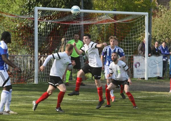 DM17421518a.jpg. Football: Horsham YMCA v Haywards Heath. Haywards Heath win the league. Photo by Derek Martin. SUS-170430-095407008