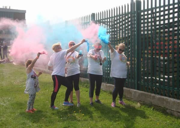 Colourful Homecall at the end of Brighton's Color Obstacle Rush SUS-170805-112133001