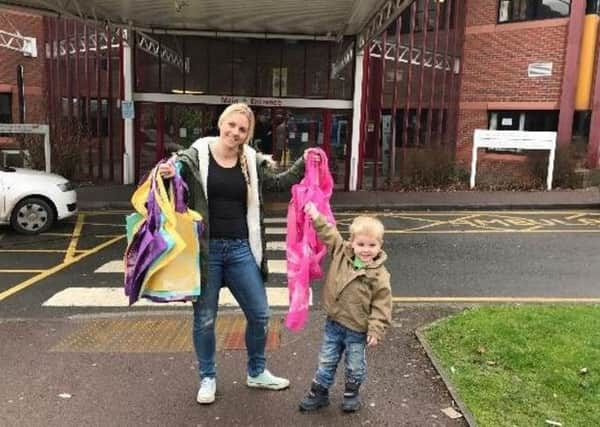 Fitness instructor Stephanie Mullins with some of the bags she has made