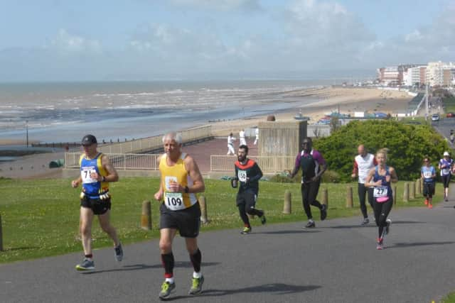 Competitors climb up the western side of Galley Hill on the opening lap.