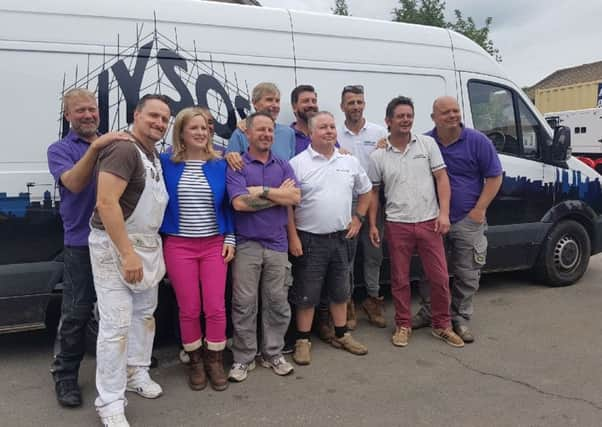 The team of volunteer decorators with the DIY SOS team at Thursday's Big Reveal