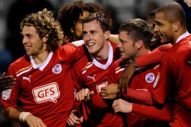 Bulman celebrates a goal for the Reds. Picture by Jon Rigby