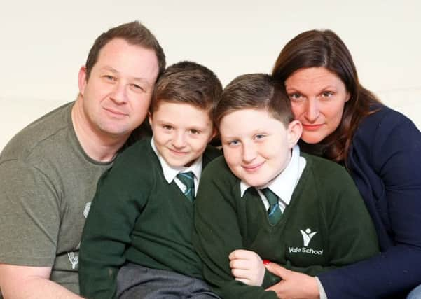 Michele Ammolla and wife Georgina with sons William and Henry. Photo by Derek Martin DM17313723a