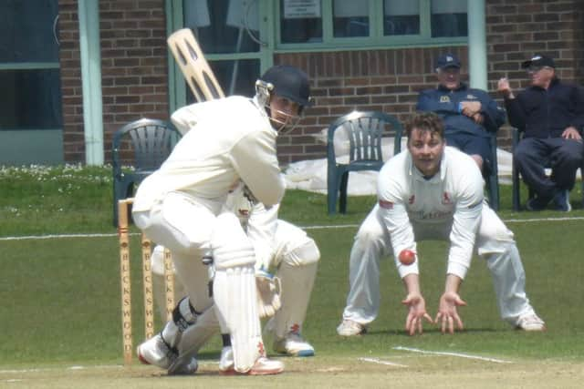 Elliot Hooper shapes up to drive against Horsham.