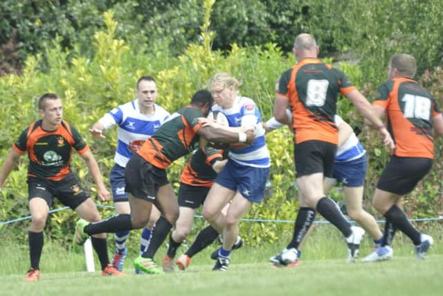 Harry Walker in possession against Burgess Hill. Picture courtesy Nigel Baker