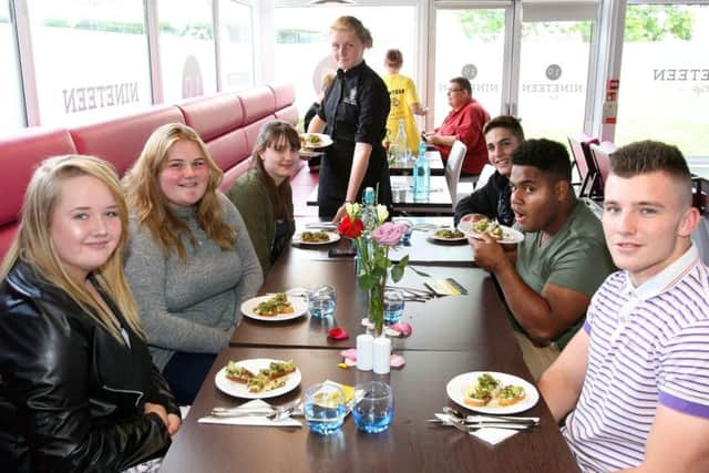 Some of the dinner guests enjoying the meals. DM17527526a.jpg