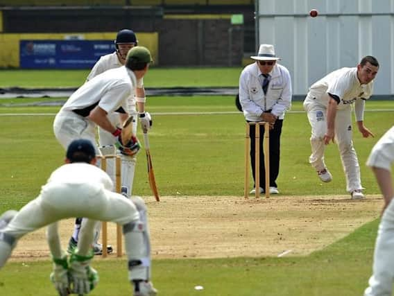 McCleod Cox took three wickets, then ended unbeaten on 38 to help Littlehampton beat league leaders Southwater. Picture by Stephen Goodger