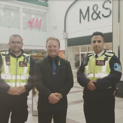 Brett McLean pictured with the business support warden and a support and training warden who will occasionally work in the town