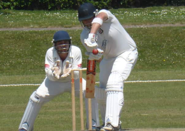 James Walker displays a solid defence for Bexhill against Horsham last weekend. Pictures by Simon Newstead