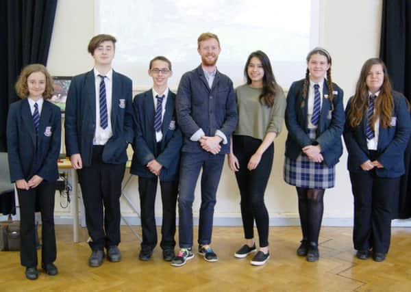 Damian Chandler, centre, with Maya Golden, Toby McEwen, Callum Seagroatt, Jazmine Nopsuwan, Jodie Nightingale and Stella Edwards