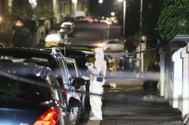 Police at the scene. Picture by Eddie Mitchell SUS-150812-100439001