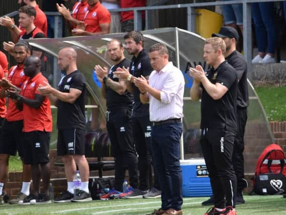 Coaching Staff and Players observe a minutes applause for Bradley Lowery.
Pic. Stuart Gibson