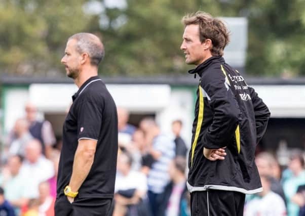 Gary Charman and Darin Killpartrick in the Rocks dugout / Picture by Tim Hale