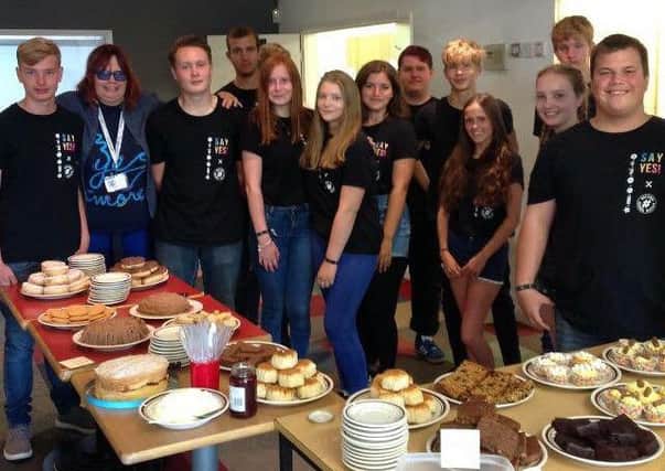 Members of Wave 1 Team 4 from West Sussex NCS at a coffee morning they organised, raising Â£171.65 for Enable Me