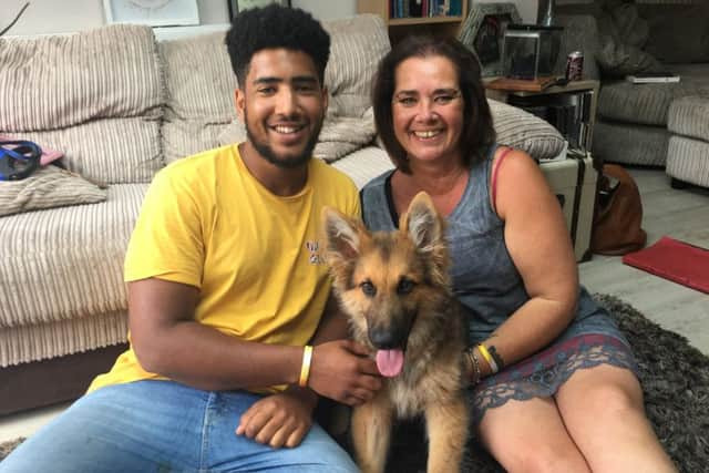 Trent and Marnie Williams with their puppy Alfie