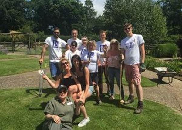 Leaders agents take up gardening to support Chestnut Tree House