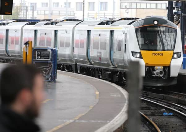 NEW Thameslink 700 TRAIN ARRIVES AT BRIGHTON STATION SUS-160620-105904001