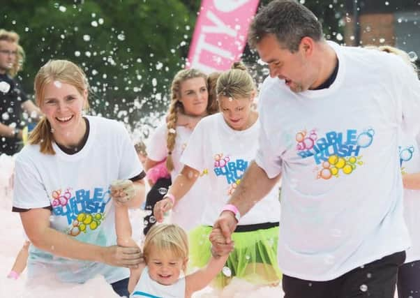 Participants having fun during the Bubble Rush SUS-160915-120621001