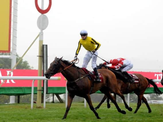 Big Orange and Jamie Spencer win the 2016 Goodwood Cup / Picture by Kate Shemilt